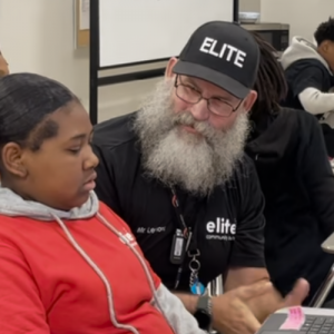 Elite Classroom Tutor helping a student out